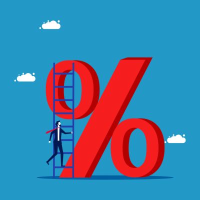 Interest rate. Businessman climbs on percentage icon with stairs
